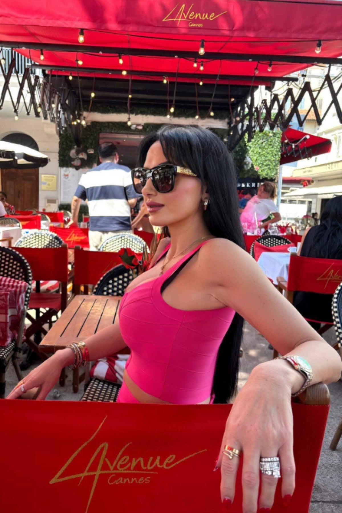 Woman wearing a figure flattering  India Bandage Top and Mini Skirt Set - Hot Pink BODYCON COLLECTION