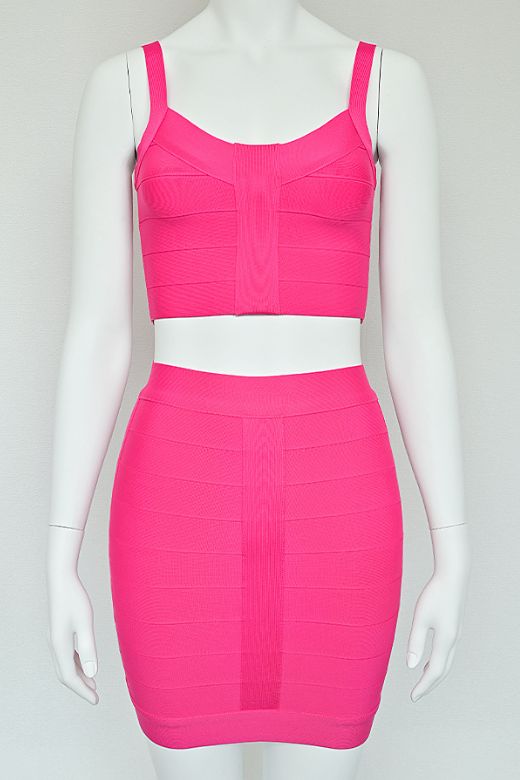 Woman wearing a figure flattering  India Bandage Top and Mini Skirt Set - Hot Pink BODYCON COLLECTION