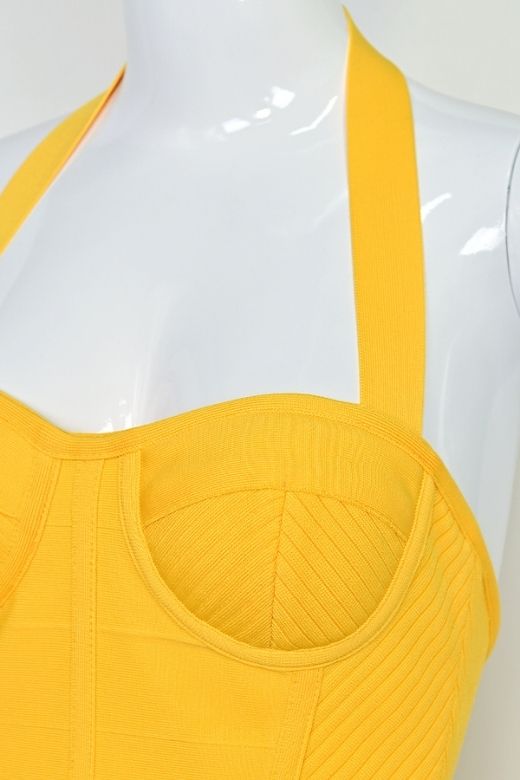 Woman wearing a figure flattering  Isabella Bandage Midi Dress - Mustard Yellow BODYCON COLLECTION Pty Ltd