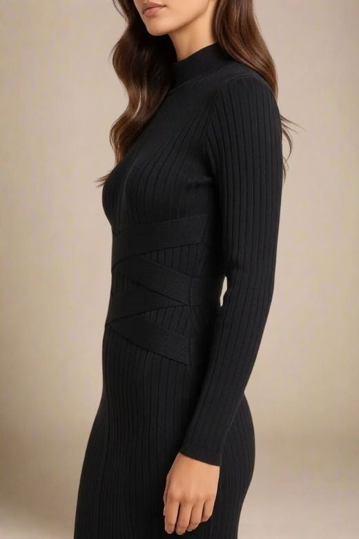 Woman wearing a figure flattering  Jane Long Sleeve Bodycon Midi Dress - Classic Black Bodycon Collection