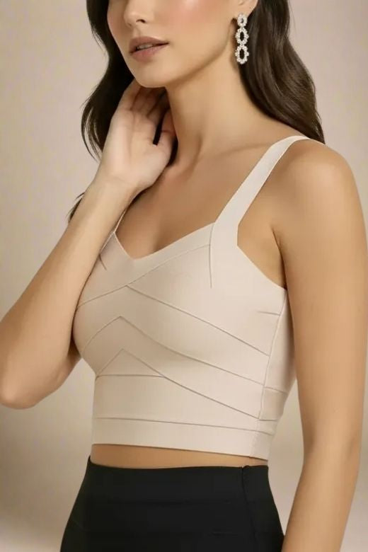 Woman wearing a figure flattering  Jay Bandage Crop Top - Cream BODYCON COLLECTION