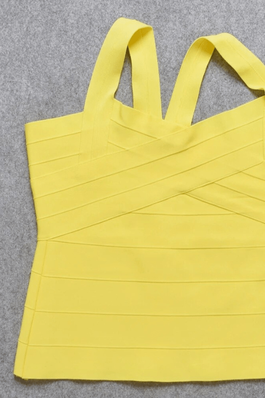 Woman wearing a figure flattering  Jay Bandage Top - Sun Yellow BODYCON COLLECTION