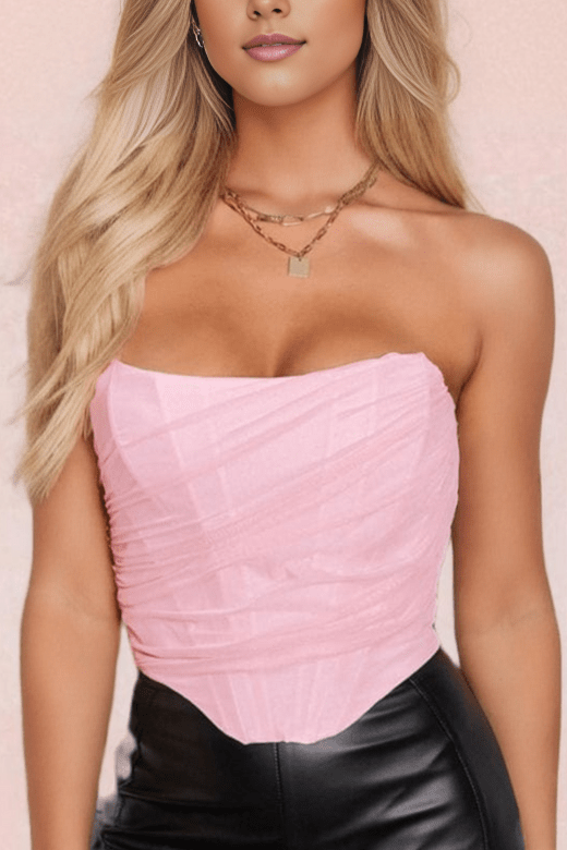 Woman wearing a figure flattering  Jen Mesh Bustier Top - Baby Pink BODYCON COLLECTION