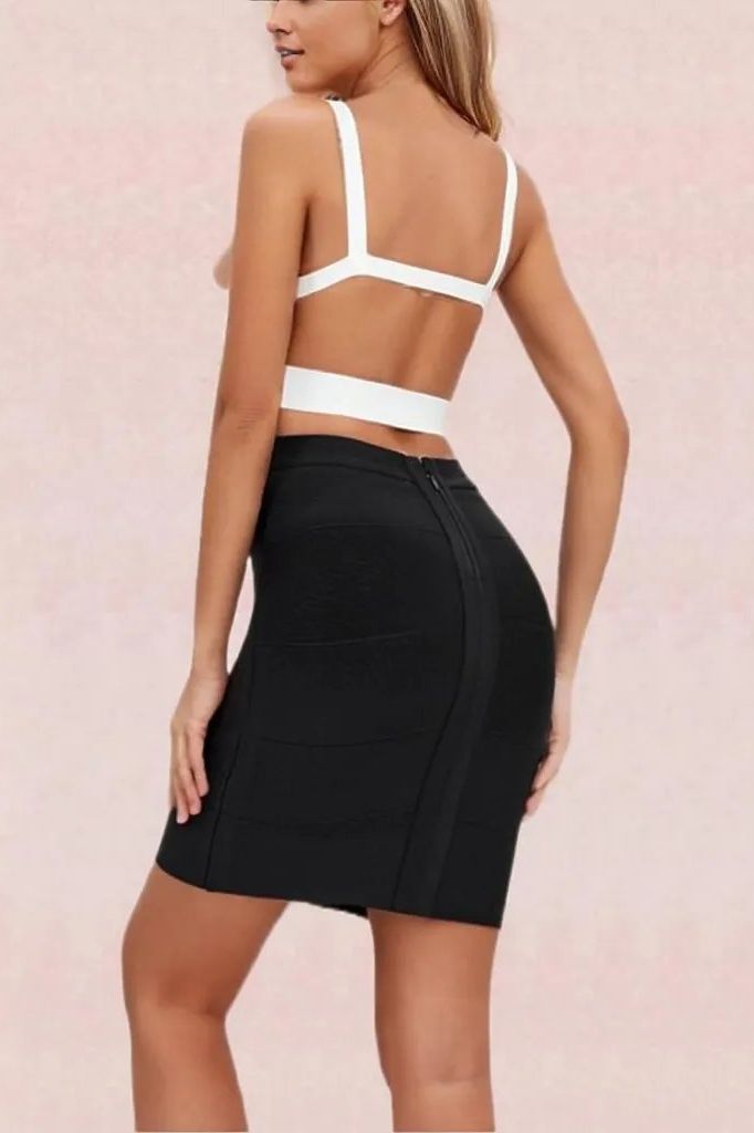 Woman wearing a figure flattering  Jess Bandage Top and Mini Skirt Set - Pearl White BODYCON COLLECTION