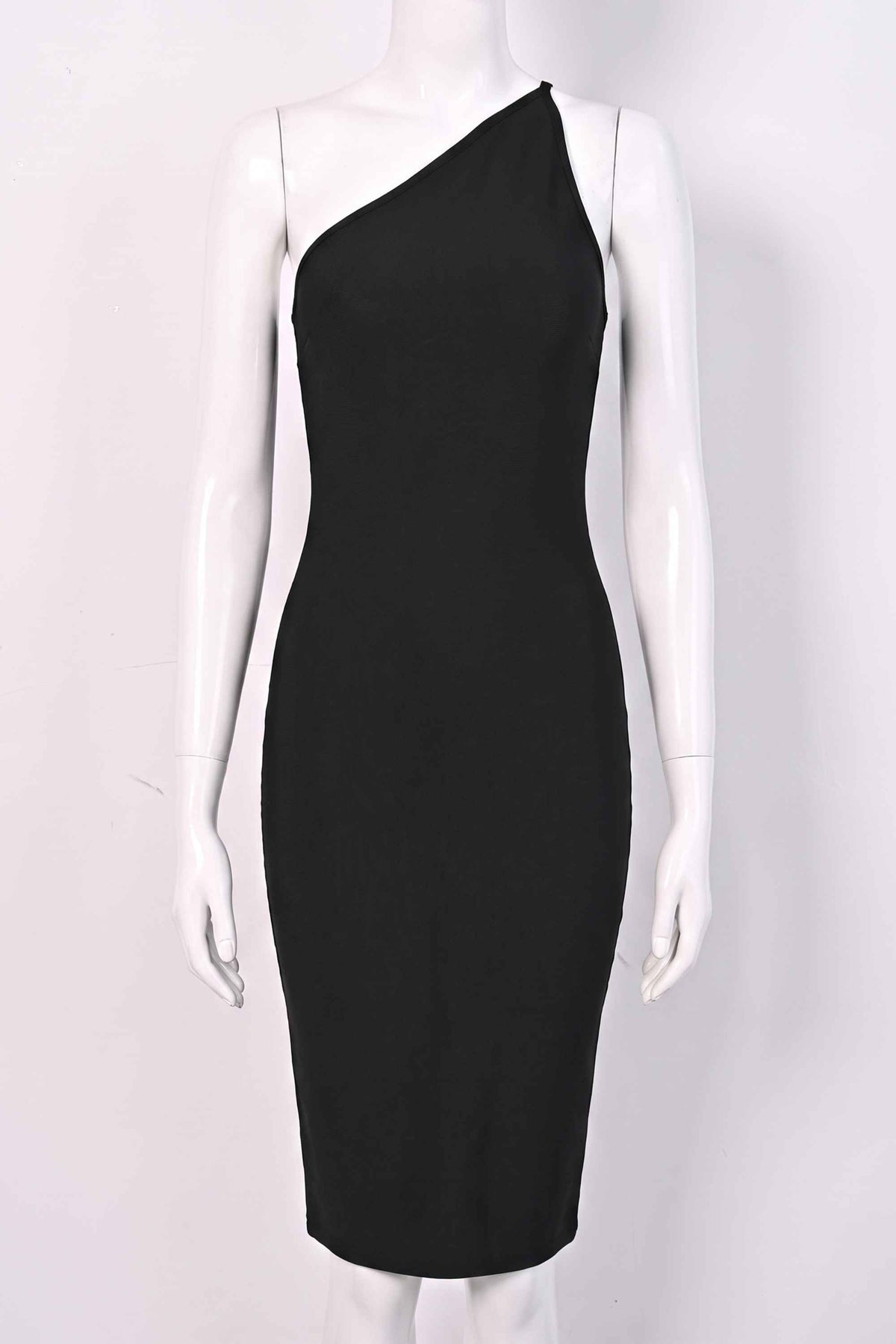Woman wearing a figure flattering  Joi Bodycon Midi Dress - Classic Black Bodycon Collection