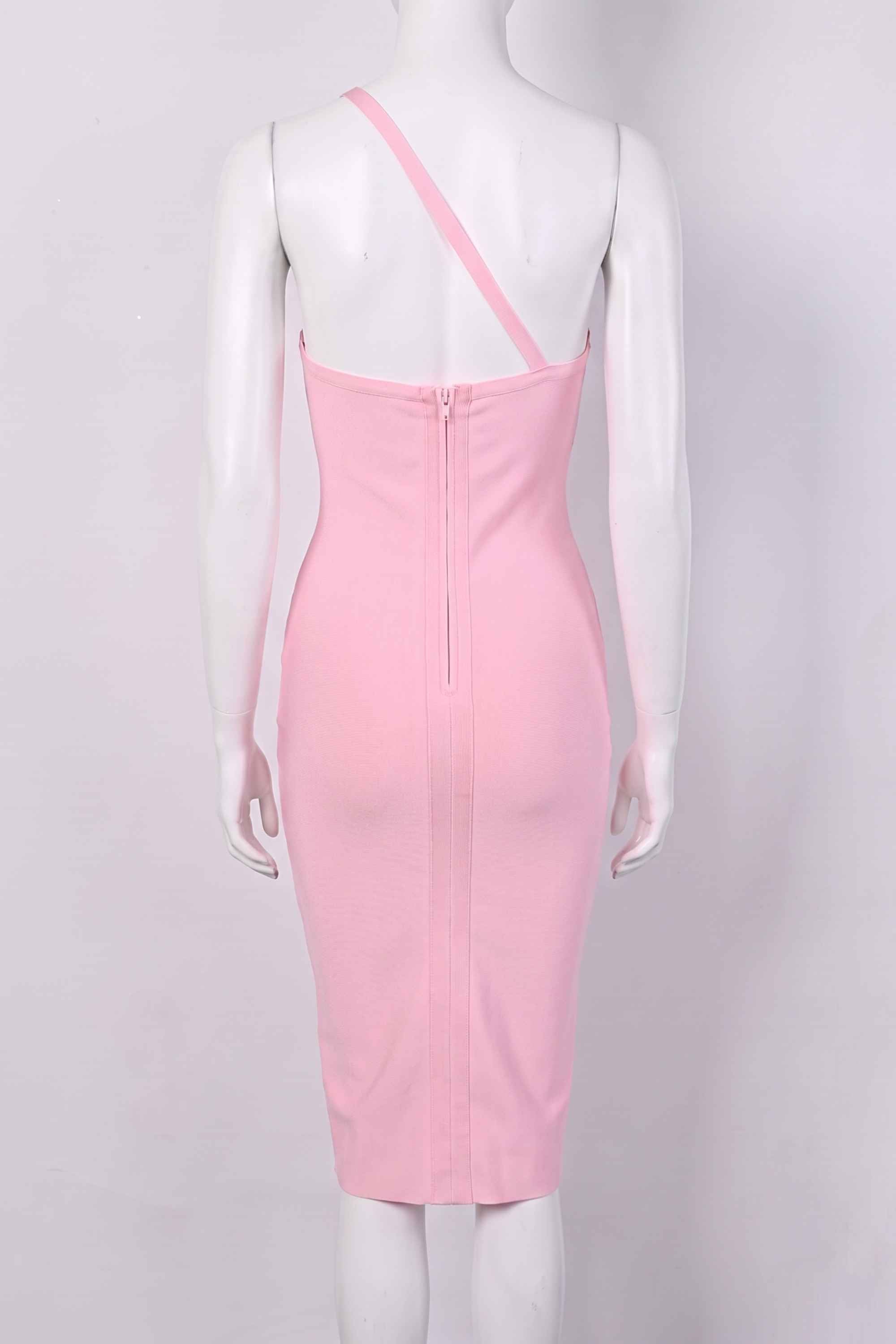 Woman wearing a figure flattering  Joi Bodycon Midi Dress - Dusty Pink Bodycon Collection