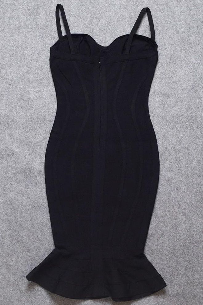 Woman wearing a figure flattering  Joy Bandage Midi Dress - Classic Black Bodycon Collection