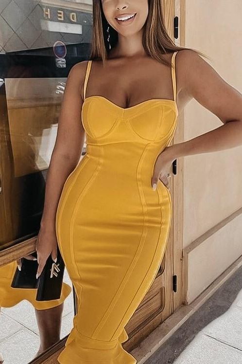 Woman wearing a figure flattering  Joy Bandage Midi Dress - Sun Yellow Bodycon Collection