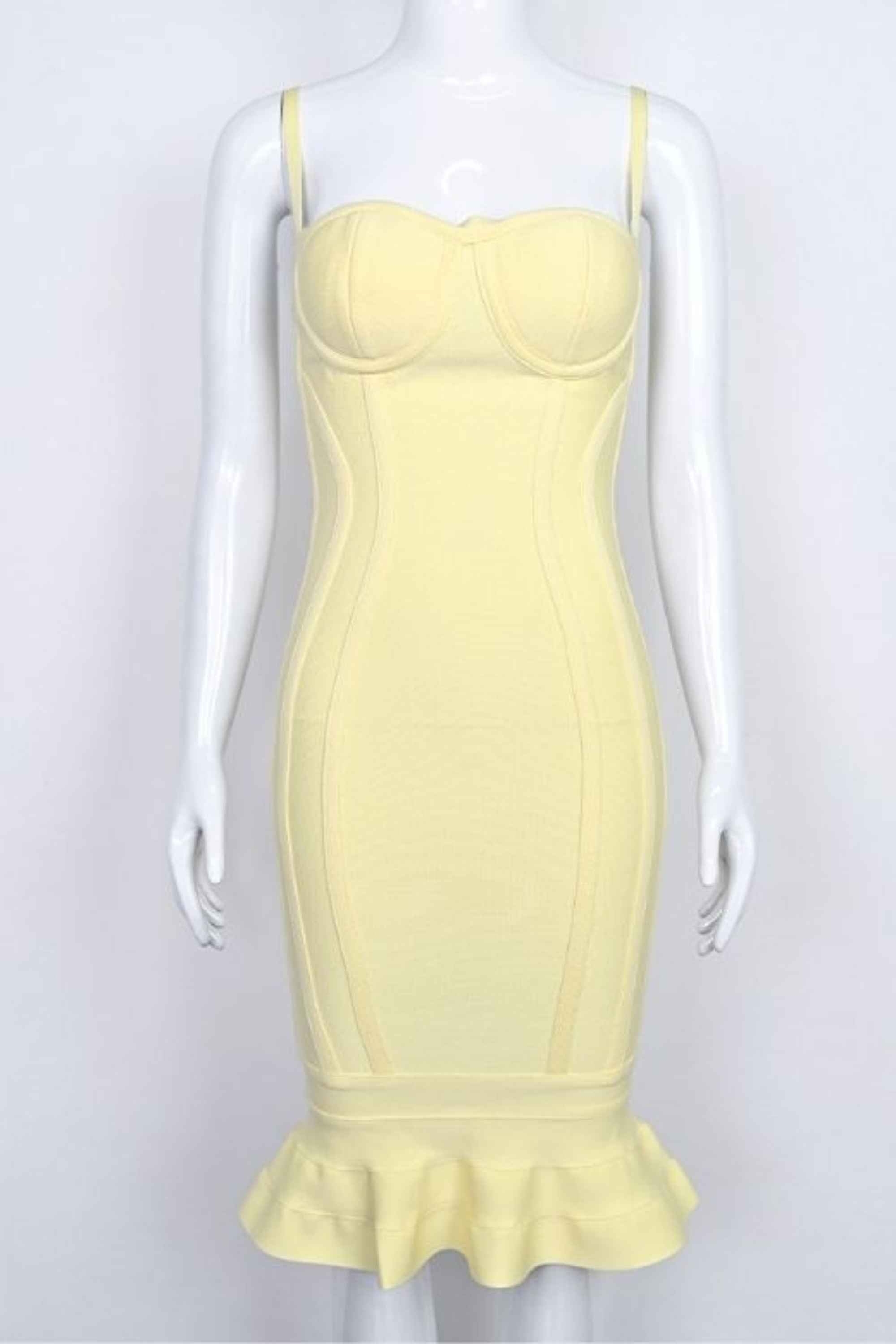 Woman wearing a figure flattering  Joy Bandage Midi Dress - Sun Yellow Bodycon Collection