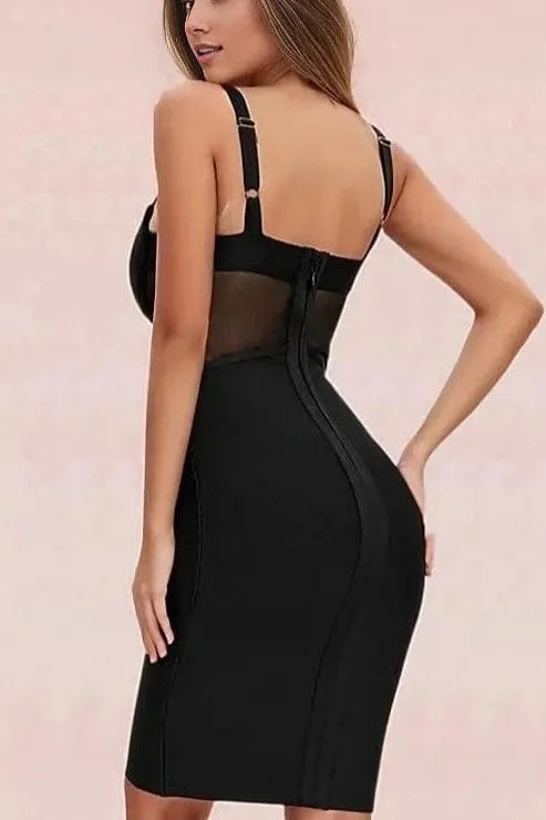 Woman wearing a figure flattering  Juliette Bodycon Dress - Classic Black Bodycon Collection