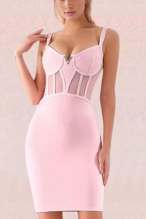 Woman wearing a figure flattering  Juliette Bodycon Dress - Dusty Pink Bodycon Collection