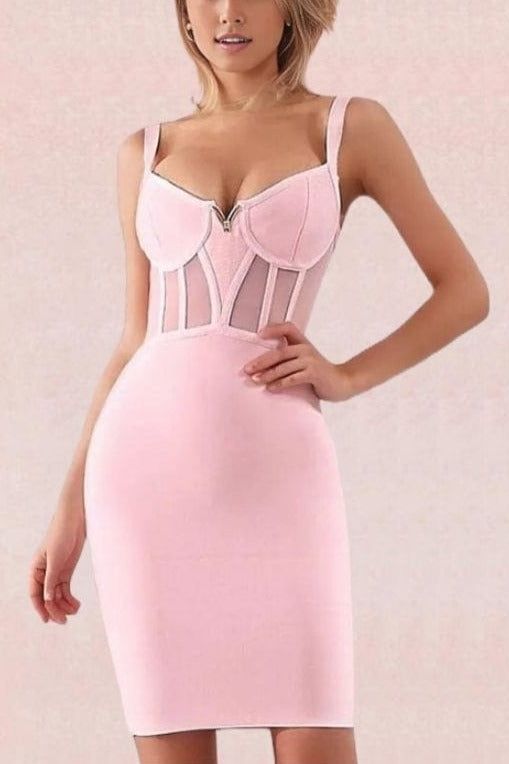 Woman wearing a figure flattering  Juliette Bodycon Dress - Dusty Pink Bodycon Collection
