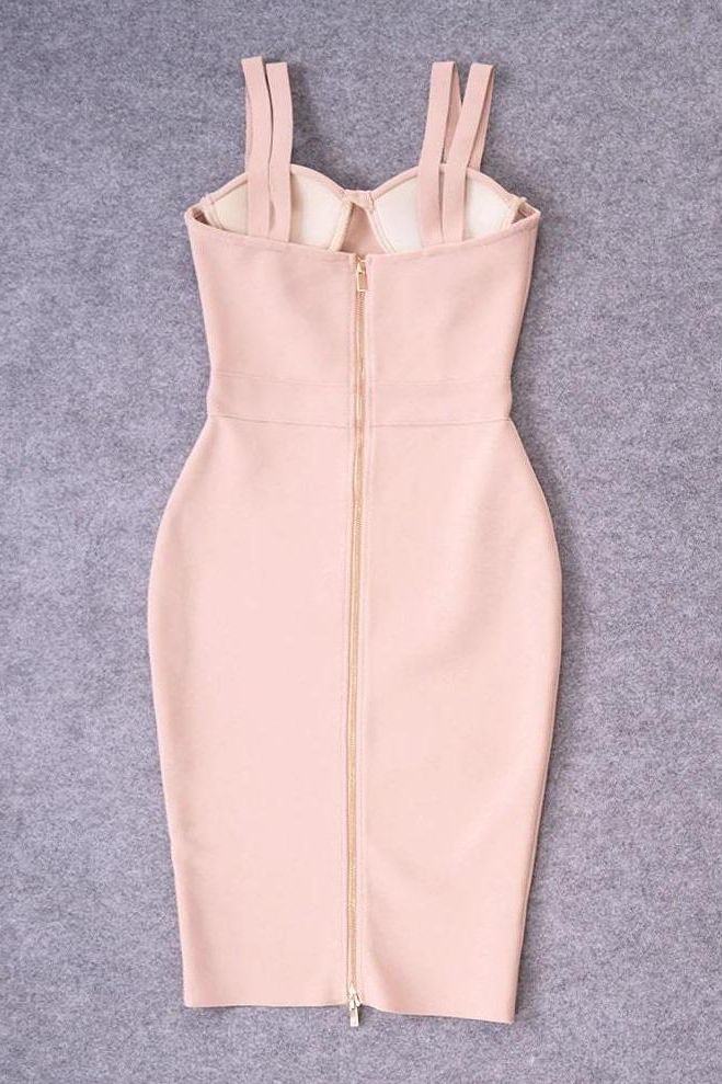 Woman wearing a figure flattering  Kate Bandage Dress - Nude Bodycon Collection