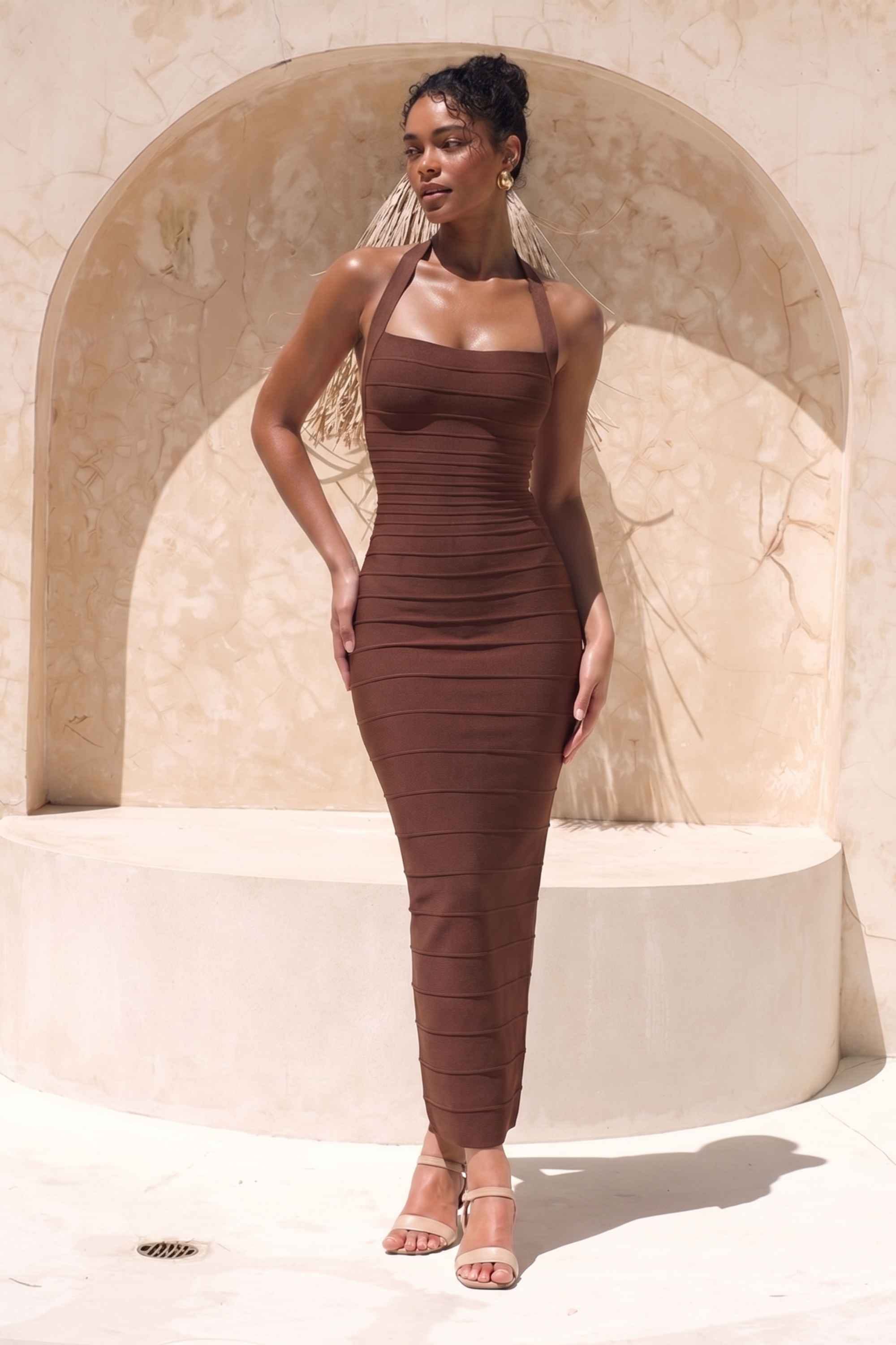 Woman wearing a figure flattering  Kia Bandage Maxi Dress - Chocolate Brown BODYCON COLLECTION Pty Ltd