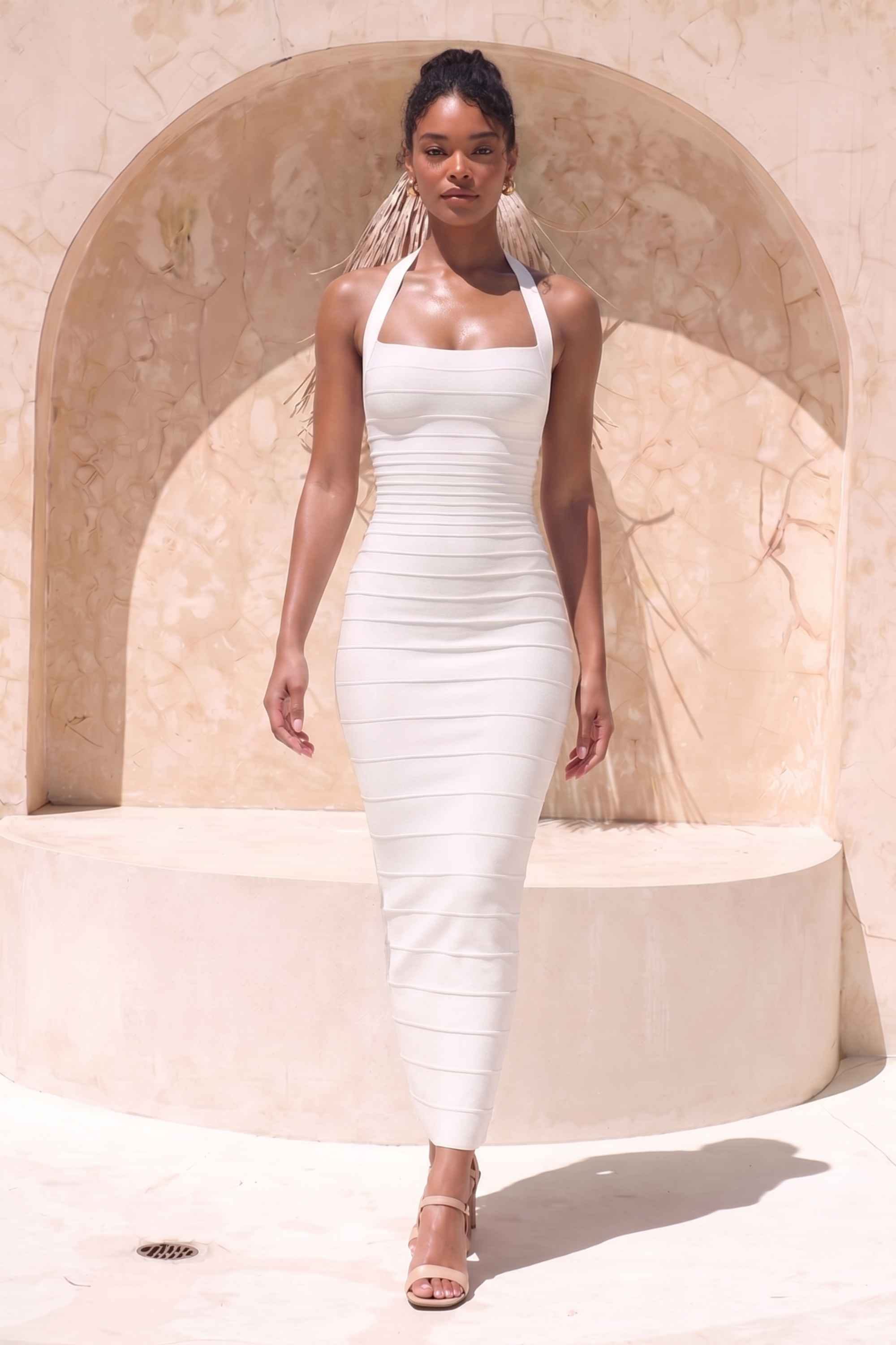 Woman wearing a figure flattering  Kia Bandage Maxi Dress - White Pearl BODYCON COLLECTION Pty Ltd