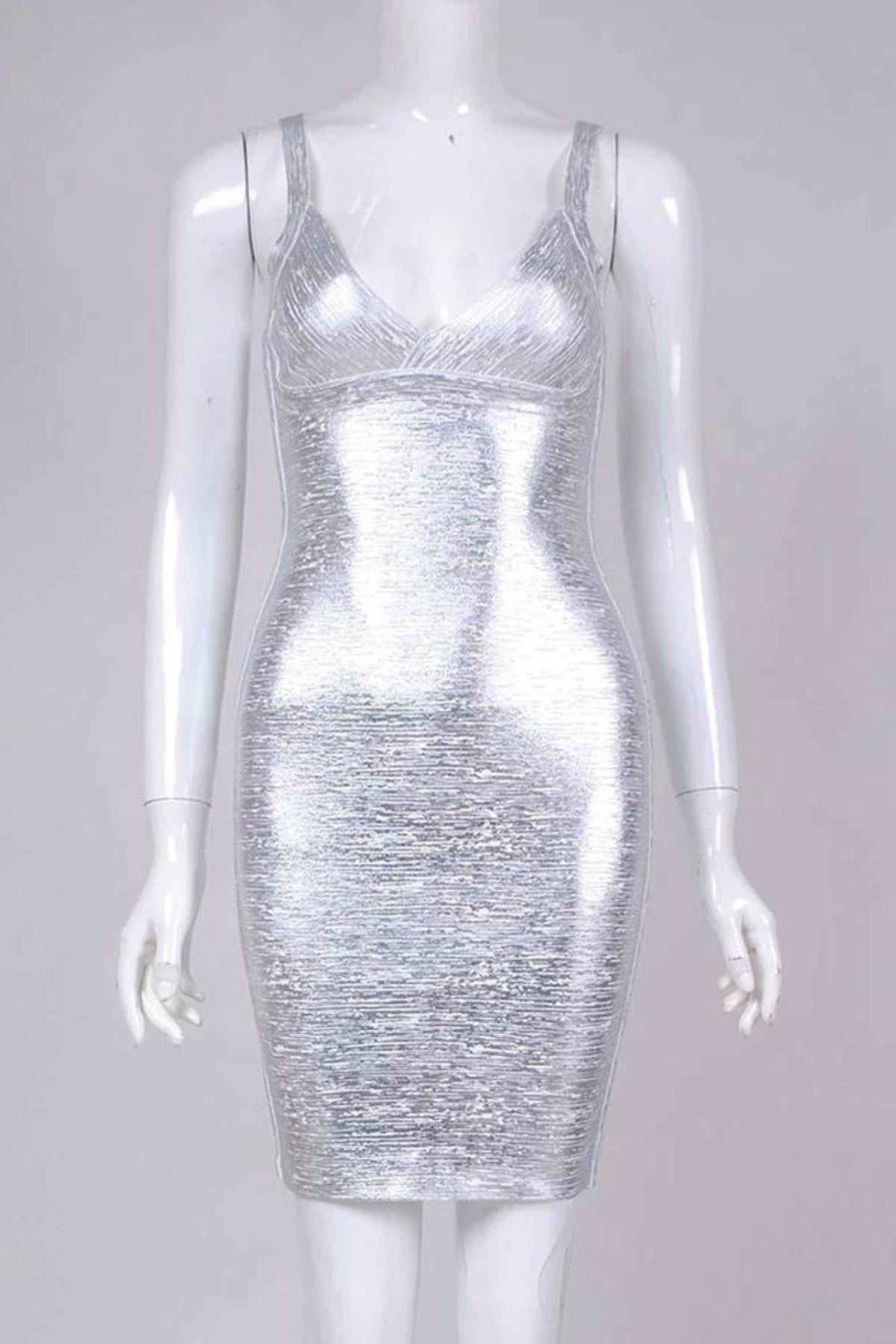 Woman wearing a figure flattering  Kit Bandage Dress - Silver Bodycon Collection