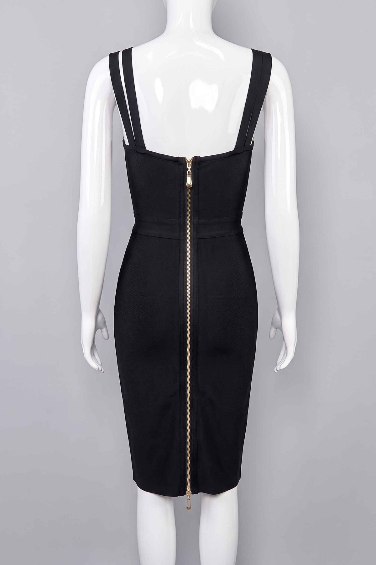 Woman wearing a figure flattering  Kate Bandage Dress - Classic Black Bodycon Collection