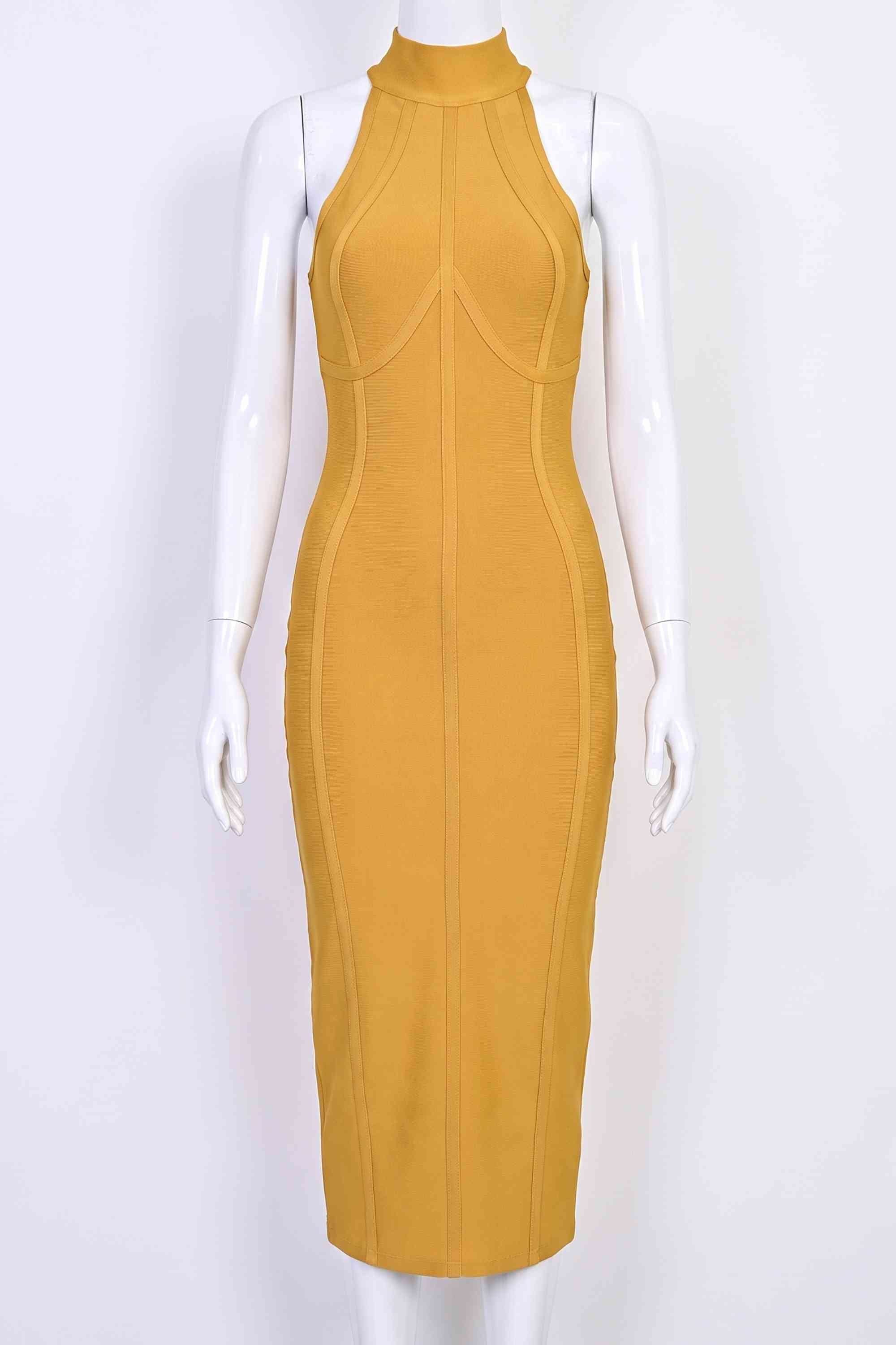 Woman wearing a figure flattering  Lea Bandage Midi Dress - Mustard Yellow Bodycon Collection