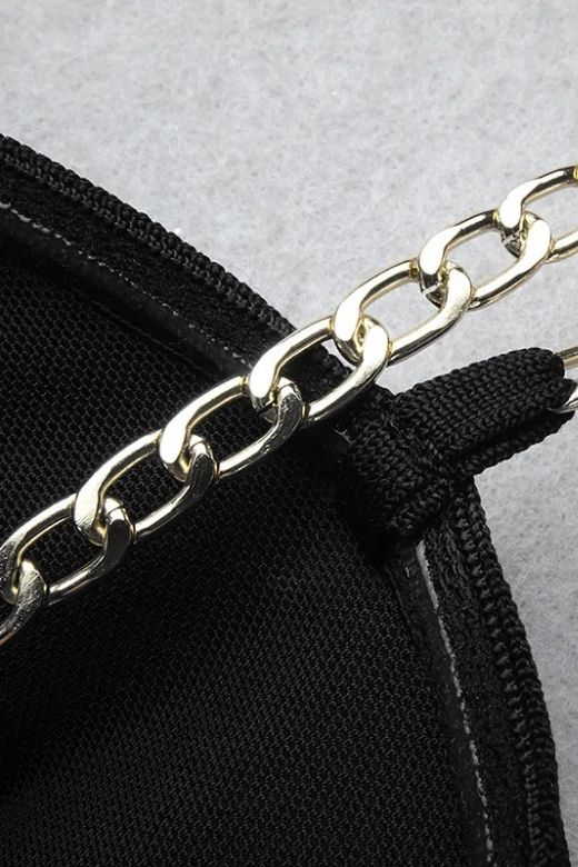 Woman wearing a figure flattering  Leah Bodycon Dress - Classic Black Bodycon Collection