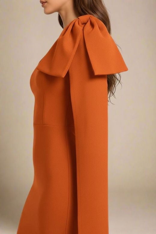 Woman wearing a figure flattering  Lela Long Sleeve Bandage Midi Dress - Apricot Orange BODYCON COLLECTION