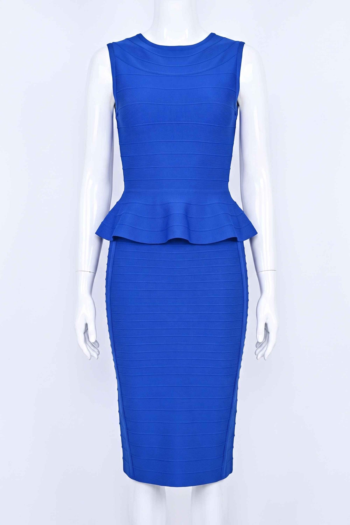 Woman wearing a figure flattering  Leni Bandage Top - Royal Blue BODYCON COLLECTION