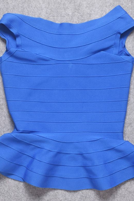 Woman wearing a figure flattering  Leni Bandage Top - Royal Blue BODYCON COLLECTION