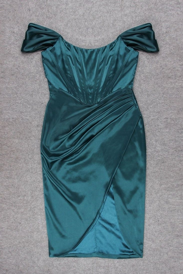 Woman wearing a figure flattering  Leona Bodycon Dress - Emerald Green BODYCON COLLECTION