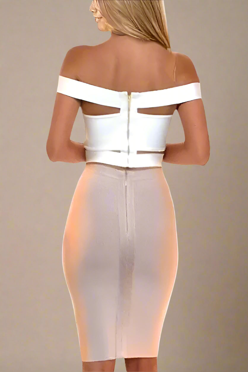 Woman wearing a figure flattering  Lexia Bandage Crop Top - Pearl White BODYCON COLLECTION