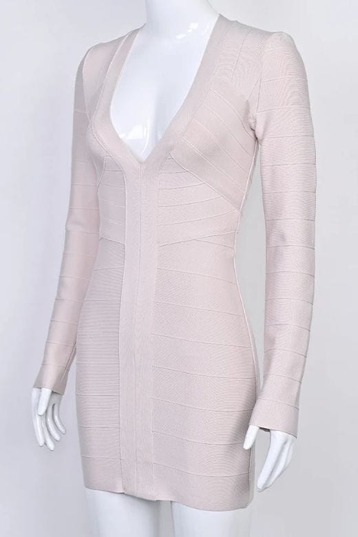 Woman wearing a figure flattering  Lisa Long Sleeve Bandage Mini Dress - Cream BODYCON COLLECTION Pty Ltd