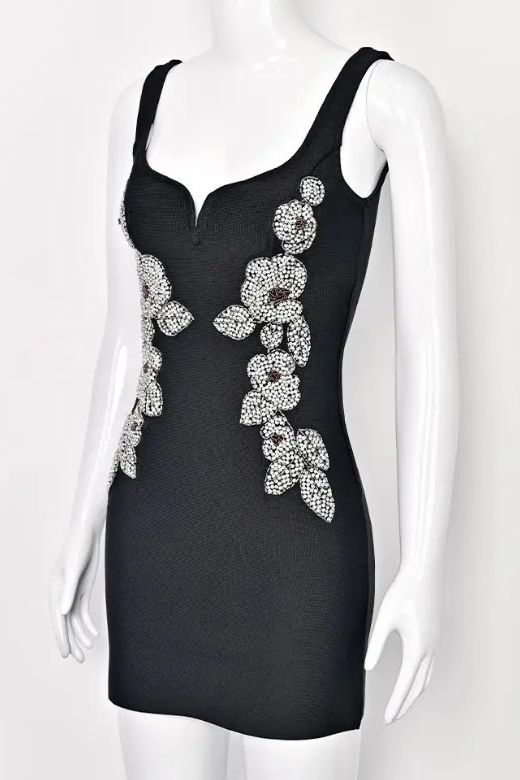 Woman wearing a figure flattering  Livia Bodycon Mini Dress - Classic Black BODYCON COLLECTION Pty Ltd