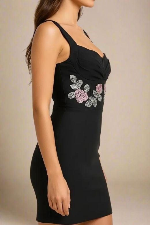 Woman wearing a figure flattering  Livia Wrap Bodycon Mini Dress - Classic Black BODYCON COLLECTION Pty Ltd