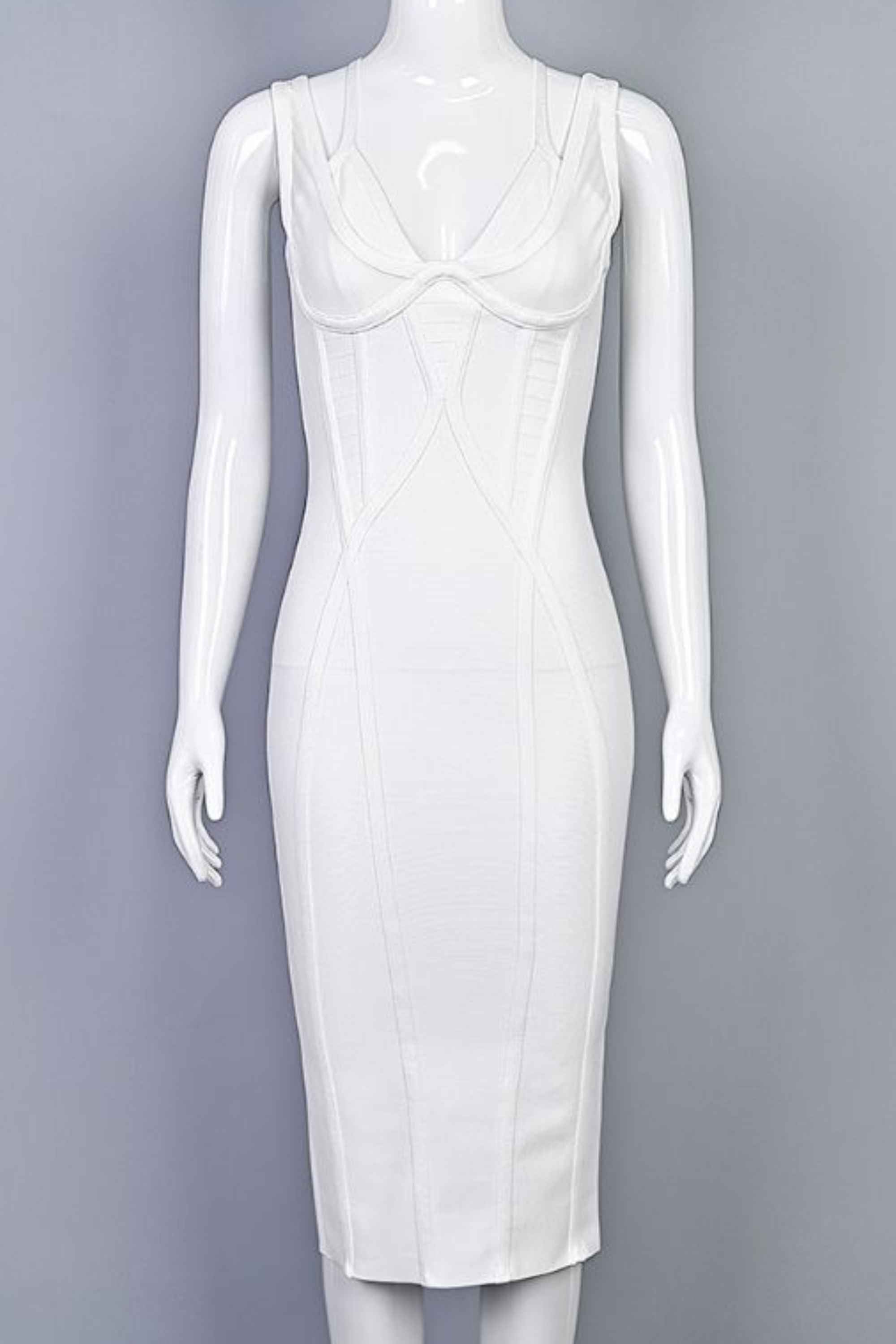 Woman wearing a figure flattering  Lucy Bandage Midi Dress - White Pearl BODYCON COLLECTION