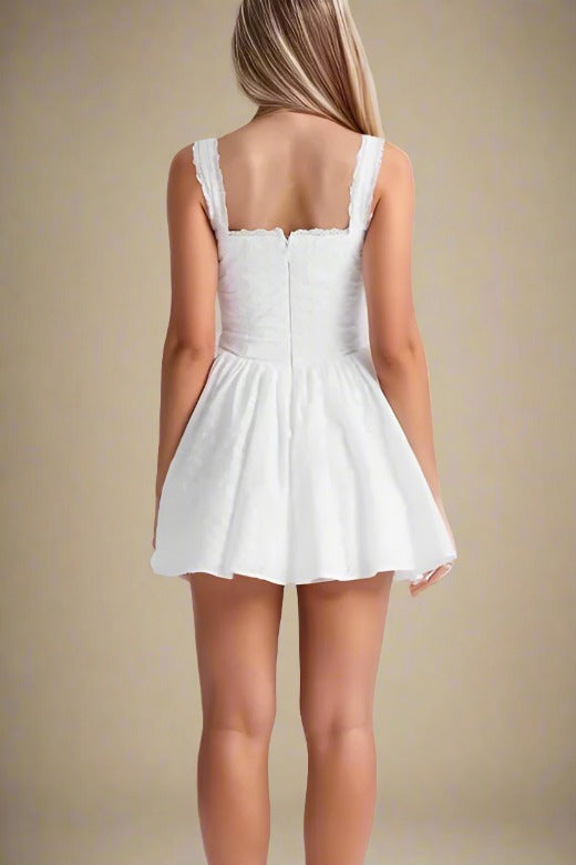 Woman wearing a figure flattering  Mari Bodycon Mini Dress - Pearl White BODYCON COLLECTION