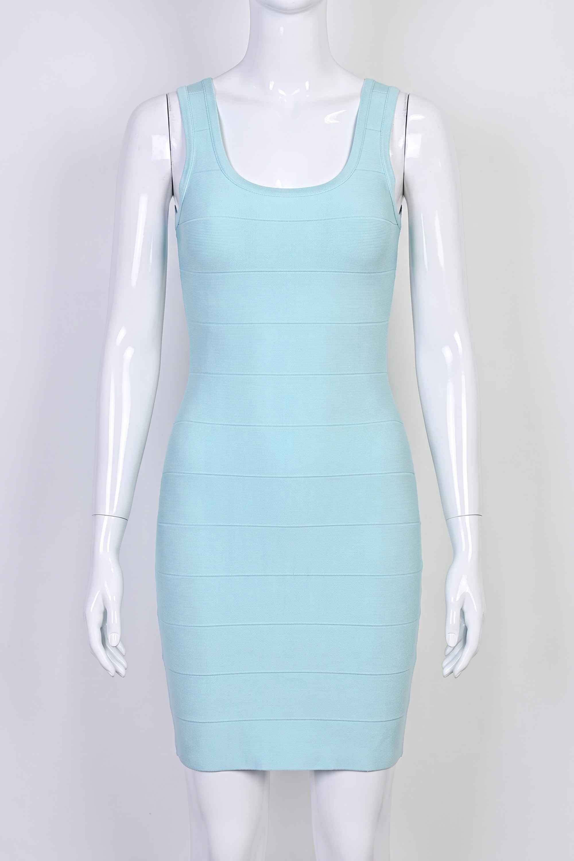 Woman wearing a figure flattering  Maria Bandage Mini Dress - Baby Blue BODYCON COLLECTION