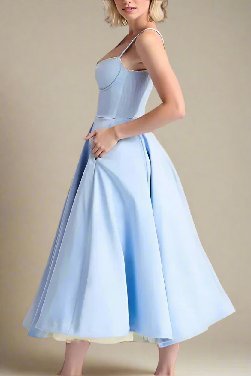 Woman wearing a figure flattering  Mavis Bodycon Midi Dress - Baby Blue BODYCON COLLECTION