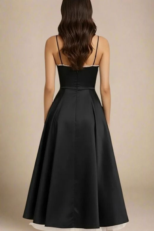 Woman wearing a figure flattering  Mavis Bodycon Midi Dress - Classic Black BODYCON COLLECTION