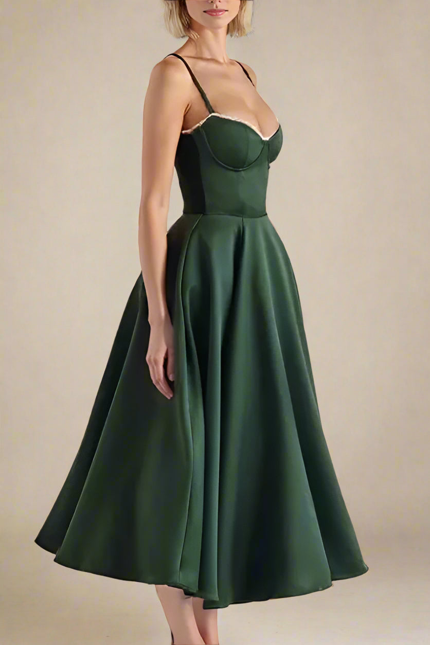 Woman wearing a figure flattering  Mavis Bodycon Midi Dress - Emerald Green BODYCON COLLECTION