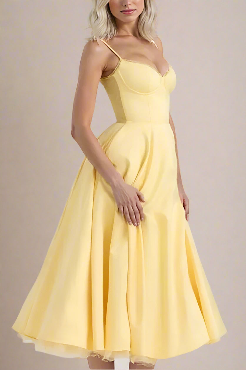 Woman wearing a figure flattering  Mavis Midi Dress - Sun Yellow BODYCON COLLECTION