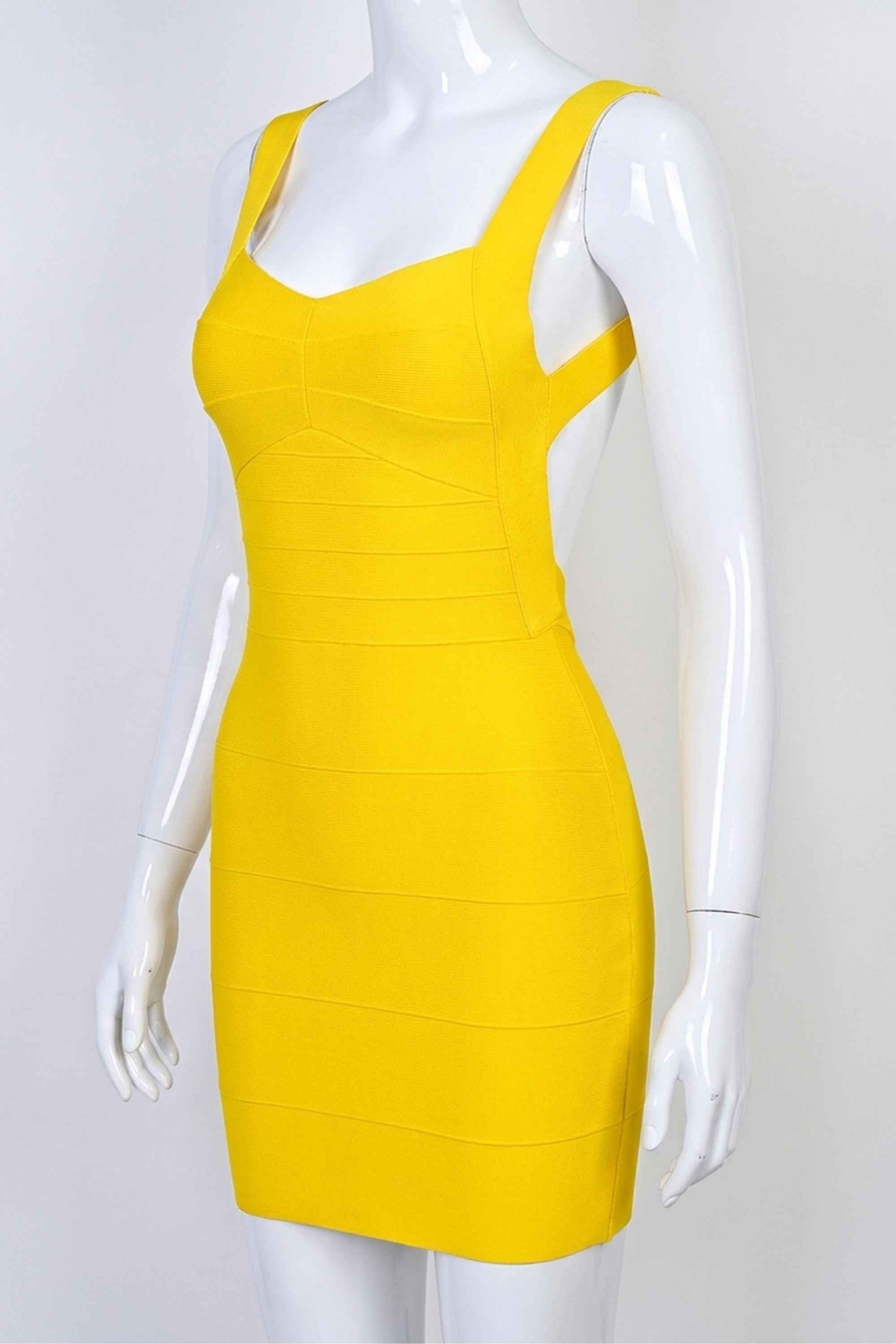 Woman wearing a figure flattering  Maya Bandage Mini Dress - Sun Yellow BODYCON COLLECTION