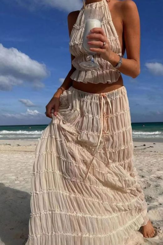 Woman wearing a figure flattering  Meryl Wrap Top and Maxi Skirt Set - Chilli Red BODYCON COLLECTION