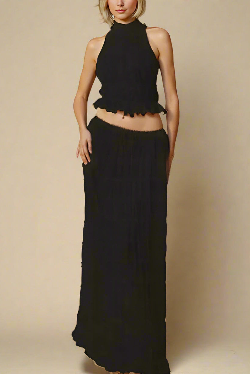Woman wearing a figure flattering  Meryl Wrap Top and Maxi Skirt Set - Classic Black BODYCON COLLECTION
