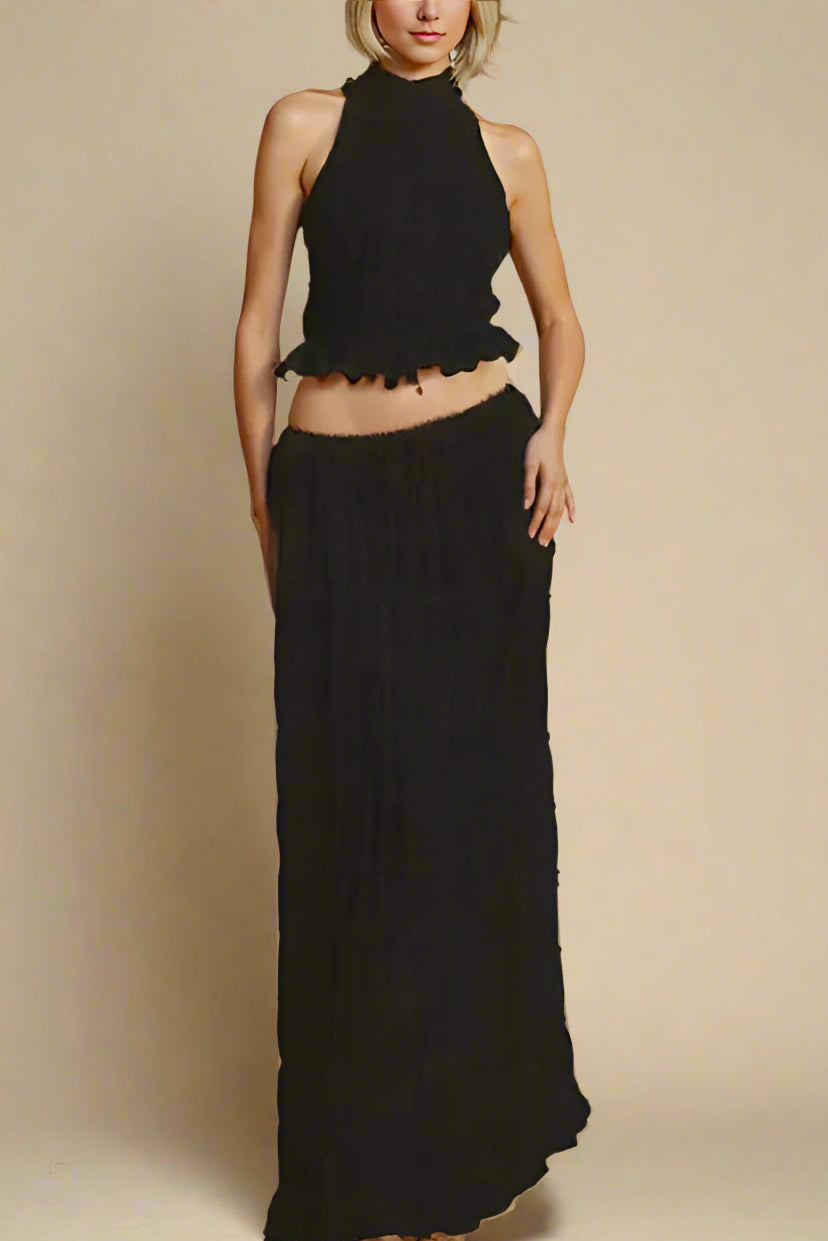 Woman wearing a figure flattering  Meryl Wrap Top and Maxi Skirt Set - Classic Black BODYCON COLLECTION