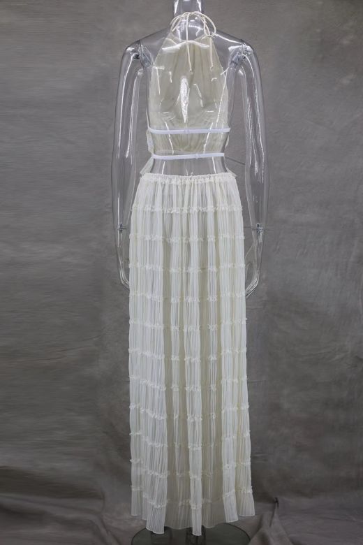 Woman wearing a figure flattering  Meryl Wrap Top and Maxi Skirt Set - Cream BODYCON COLLECTION