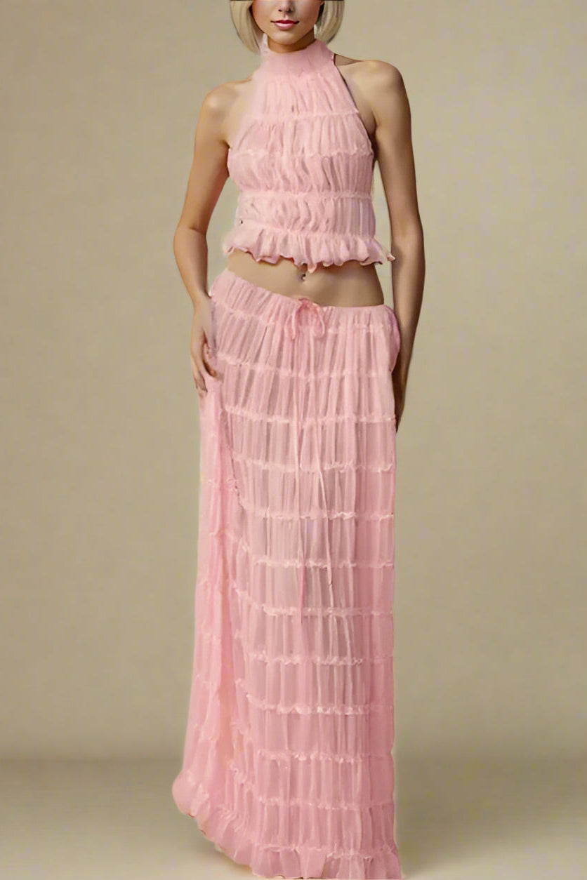 Woman wearing a figure flattering  Meryl Wrap Top and Maxi Skirt Set - Pink Fuzz BODYCON COLLECTION