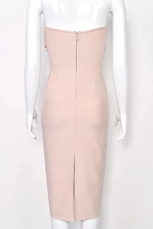 Woman wearing a figure flattering  Miles Bodycon Midi Dress - Nude BODYCON COLLECTION