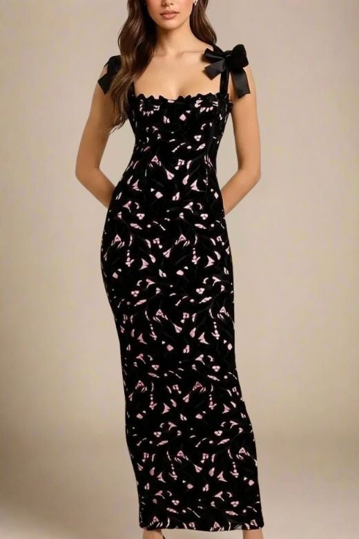 Woman wearing a figure flattering  Odette Bodycon Lace Maxi Dress - Classic Black BODYCON COLLECTION