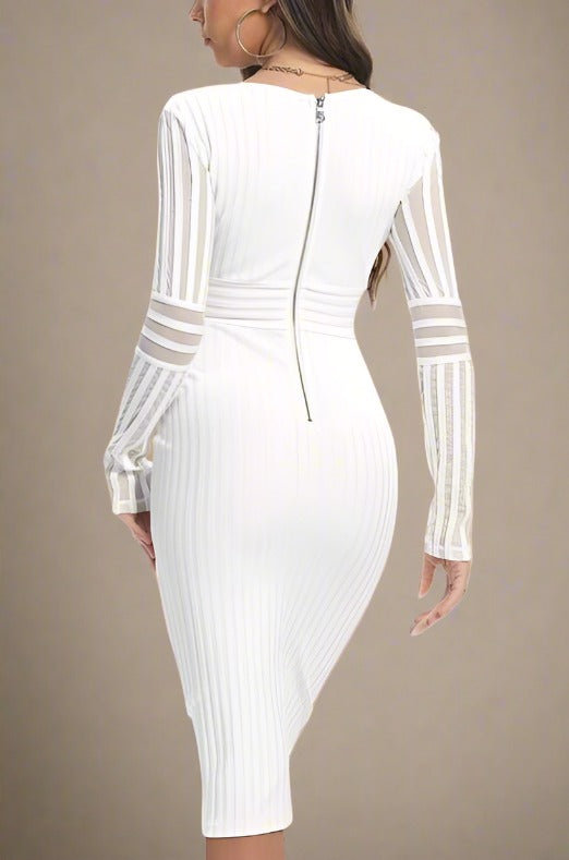 Woman wearing a figure flattering  Olivia Long Sleeve Bandage Midi Dress - Pearl White Bodycon Collection