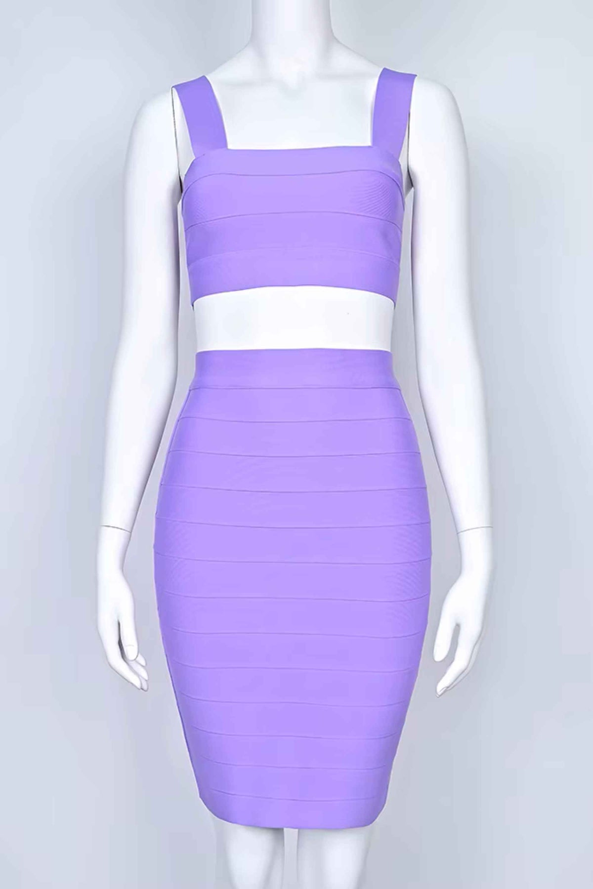 Woman wearing a figure flattering  Ophelia Bandage Crop Top and Skirt Set - Violet BODYCON COLLECTION Pty Ltd