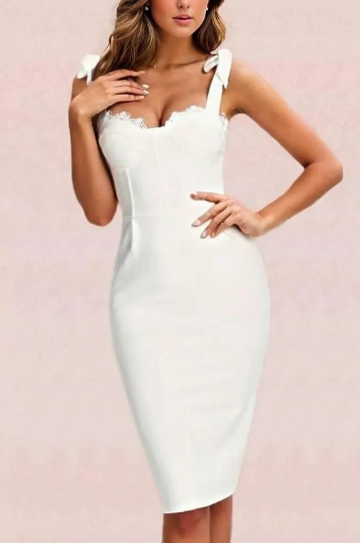 Woman wearing a figure flattering  Payton Bandage Dress - Pearl White BODYCON COLLECTION
