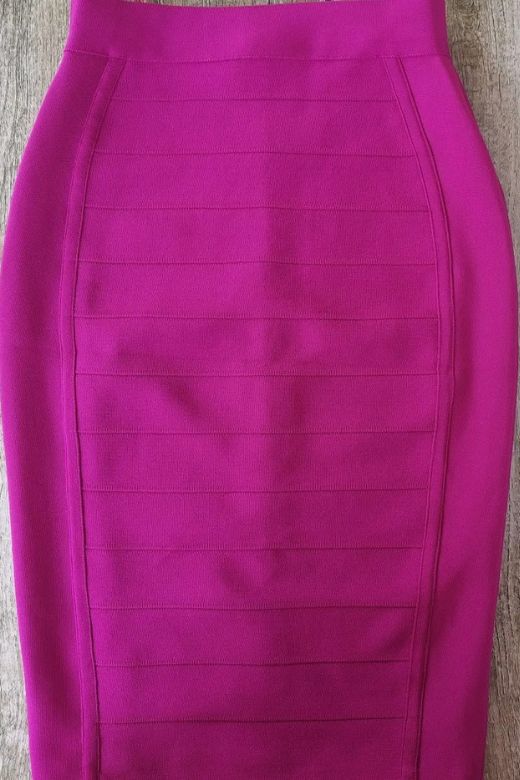 Woman wearing a figure flattering  Pencil High Waist Bandage Knee Length Cocktail Skirt - Magenta Pink BODYCON COLLECTION